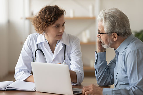 Woman Doctor with patient