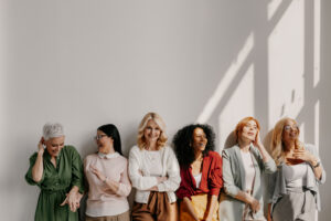Diverse group of women posing and smiling
